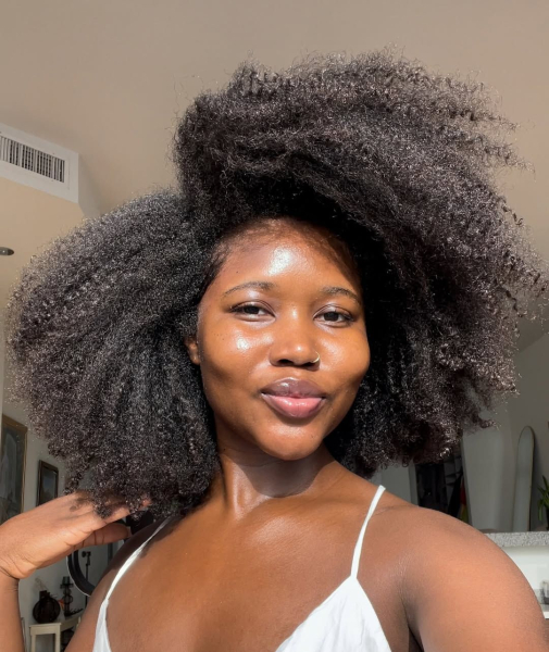 Black woman with long 4C natural hair