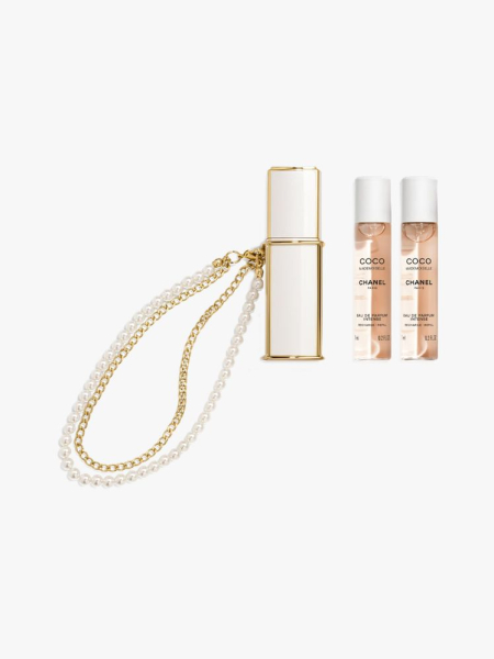 Chanel Coco Mademoiselle Eau de Parfum Intense Purse Spray in branded components on a light gray background